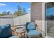 Cozy patio with wicker chairs and a view of the backyard at 747 Coquina Bay Dr., Conway, SC 29526