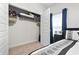 Well-lit bedroom closet with hanging rods and shelving at 797 Harrison Mill St., Myrtle Beach, SC 29588