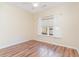 Bedroom with hardwood floors, ceiling fan and large window at 817 Payne Ct., Conway, SC 29526