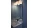 Bright bathroom with white countertop vanity, stylish lighting, and modern fixtures at 931 Edge Dr., North Myrtle Beach, SC 29582