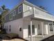 This two story home features an outdoor patio on its second story at 931 Edge Dr., North Myrtle Beach, SC 29582