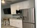 This kitchen features stainless steel appliances and modern fixtures at 931 Edge Dr., North Myrtle Beach, SC 29582