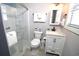 Clean bathroom with glass-enclosed shower, modern vanity, and fresh towels at 9620 Windchime Dr., Myrtle Beach, SC 29572