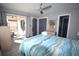 Serene bedroom with beach-themed decor, and access to outdoor patio at 9620 Windchime Dr., Myrtle Beach, SC 29572