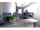 Well-lit kitchen featuring modern appliances, stylish countertops, and beautiful blue backsplash at 9620 Windchime Dr., Myrtle Beach, SC 29572