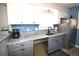Well-equipped kitchen with stainless steel appliances, granite countertops, and ample storage at 9620 Windchime Dr., Myrtle Beach, SC 29572