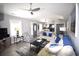 Inviting living space with modern decor, light-colored walls, open layout, and wood-look flooring at 9620 Windchime Dr., Myrtle Beach, SC 29572