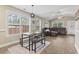 Bright dining area with bench seating and view into living room at 112 Cappin Ln., Aynor, SC 29511