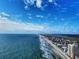 Aerial view of coastline, beach, and oceanfront properties at 1210 N Waccamaw Dr. # 702, Murrells Inlet, SC 29576