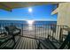 Private balcony overlooking the ocean with comfortable seating at 1210 N Waccamaw Dr. # 702, Murrells Inlet, SC 29576