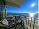 Enjoy ocean views from this relaxing balcony, wicker chairs provided at 1210 N Waccamaw Dr. # 702, Murrells Inlet, SC 29576