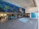 Indoor heated pool and hot tub area with ocean mural at 1210 N Waccamaw Dr. # 702, Murrells Inlet, SC 29576