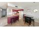 Bright kitchen with breakfast bar and dining area at 1210 N Waccamaw Dr. # 702, Murrells Inlet, SC 29576