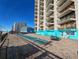 Relaxing patio area with lounge chairs and picnic tables at 1210 N Waccamaw Dr. # 702, Murrells Inlet, SC 29576