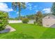 Spacious backyard with lush lawn and storage shed at 204 Atoll Dr., Myrtle Beach, SC 29588
