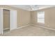 Simple bedroom with neutral walls, carpet flooring, and a double door closet at 204 Atoll Dr., Myrtle Beach, SC 29588