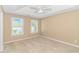 Well-lit bedroom with neutral walls, carpet flooring, and window blinds at 204 Atoll Dr., Myrtle Beach, SC 29588