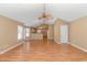 Bright living room with hardwood floors, vaulted ceiling and ceiling fan at 204 Atoll Dr., Myrtle Beach, SC 29588