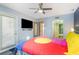 Bedroom with large TV, a full bed, and view of a bathroom at 211 Baslow Ct. # 2-C, Myrtle Beach, SC 29572