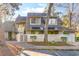 Exterior view of charming townhome with gray siding and a gray roof at 211 Baslow Ct. # 2-C, Myrtle Beach, SC 29572