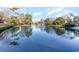 Serene lakefront community with walking path and lush landscape at 211 Baslow Ct. # 2-C, Myrtle Beach, SC 29572