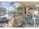Waterfront patio with seating and lake views at 211 Baslow Ct. # 2-C, Myrtle Beach, SC 29572