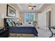 Spacious bedroom with a king-size bed and large window at 2180 Waterview Dr. # 637, North Myrtle Beach, SC 29582