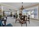 Elegant dining room with a glass-top table and chandelier at 2180 Waterview Dr. # 637, North Myrtle Beach, SC 29582