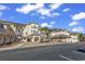 Exterior of a charming three-story building with palm trees and a parking lot at 2180 Waterview Dr. # 637, North Myrtle Beach, SC 29582