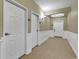 Bright hallway with neutral carpeting and doors at 2180 Waterview Dr. # 637, North Myrtle Beach, SC 29582