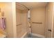 Clean bathroom with tub shower, grab bars and shower curtain at 2200 N Ocean Blvd., North Myrtle Beach, SC 29582