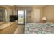 Primary bedroom with ocean view and balcony access at 2200 N Ocean Blvd., North Myrtle Beach, SC 29582