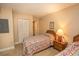 Bedroom with twin beds and adjacent bath at 2200 N Ocean Blvd., North Myrtle Beach, SC 29582