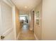 Bright hallway with tile flooring leading to living area at 2200 N Ocean Blvd., North Myrtle Beach, SC 29582