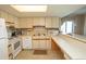 Kitchen with white appliances and ample counter space at 2200 N Ocean Blvd., North Myrtle Beach, SC 29582