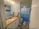 Bright bathroom with granite countertop and blue and white accents at 222 Westleton Dr. # 18-C, Myrtle Beach, SC 29572