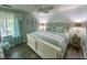 Relaxing bedroom with a queen-sized bed, coastal décor, and shiplap accent wall at 222 Westleton Dr. # 18-C, Myrtle Beach, SC 29572