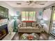 Bright and cozy living room showcasing stylish furnishings and a decorative fireplace at 222 Westleton Dr. # 18-C, Myrtle Beach, SC 29572