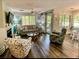 Cozy living room with stylish decor, fireplace, and access to the outdoor porch area at 222 Westleton Dr. # 18-C, Myrtle Beach, SC 29572