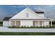 Single-Gathering home featuring a covered porch, a two-car garage, and well-maintained landscaping at 2220 Pettus Way, Surfside Beach, SC 29575
