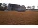 Spacious single-Gathering home with an attached two-car garage and large yard at 2220 Pettus Way, Surfside Beach, SC 29575