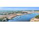 Breathtaking aerial view of a tranquil marina with boats along the waterfront near marshland at 239 Madison Dr., Georgetown, SC 29440