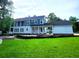 Two-story home with a large yard and covered porch is under construction at 239 Madison Dr., Georgetown, SC 29440