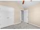 Spacious bedroom with double doors and bathroom access at 248 Hickory Springs Ct., Conway, SC 29527