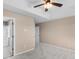Bedroom with ceiling fan and access to bathroom at 248 Hickory Springs Ct., Conway, SC 29527
