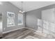 Bright dining area with hardwood floors and two windows at 248 Hickory Springs Ct., Conway, SC 29527