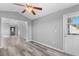 Spacious dining room with grey walls and vinyl flooring, view into another room at 248 Hickory Springs Ct., Conway, SC 29527