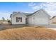 Nice gray house with a two-car garage and a spacious yard at 248 Hickory Springs Ct., Conway, SC 29527
