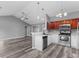 Modern kitchen with cherry wood cabinets and stainless steel appliances at 248 Hickory Springs Ct., Conway, SC 29527