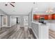 Modern kitchen with cherry wood cabinets and stainless steel appliances at 248 Hickory Springs Ct., Conway, SC 29527
